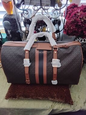Michael Kors Brown Monogram Duffel with Tan Trim and Black Stripe